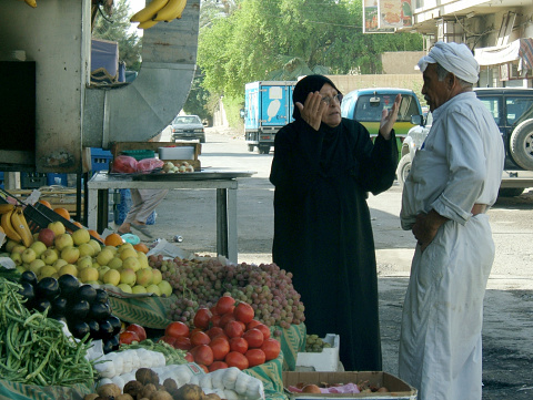 Iraq, Baghdad - 2 may 2005 Seller sells fruits and vegetables on the street