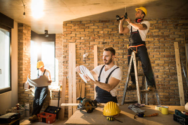 istock Busy construction workers working on home improvement in the apartment. 1158376497
