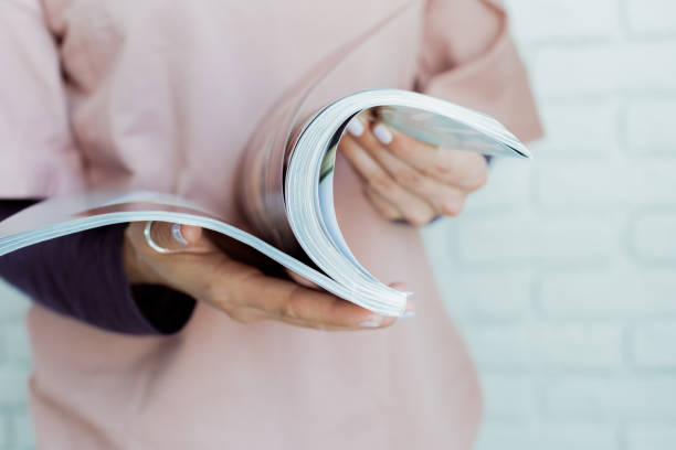 istock woman reading a magazine 1158379061