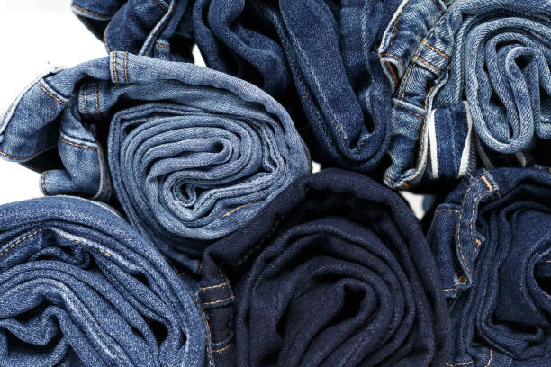 istock torn jeans stack background blue denim fashion beauty 1158380203