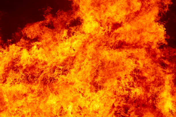 istock Fire flames detail. Fireman emergency. Carbon emission 1158381250