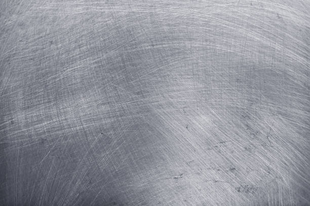 istock aluminium texture background, scratches on stainless steel. 1158381388