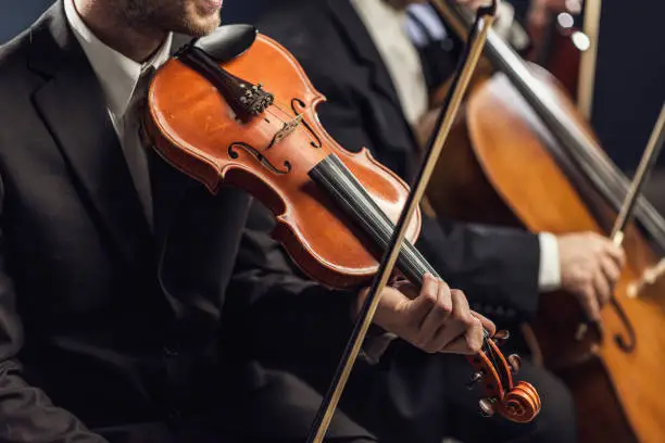 Photo of Symphonic string orchestra performing on stage