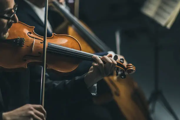 Photo of Symphonic string orchestra performing on stage