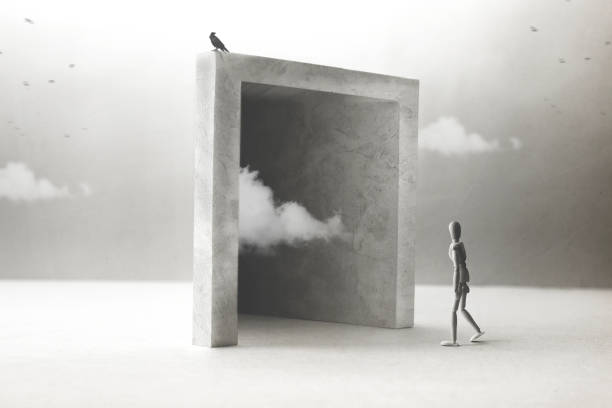 istock wooden model walking through a magical surreal door 1158385589