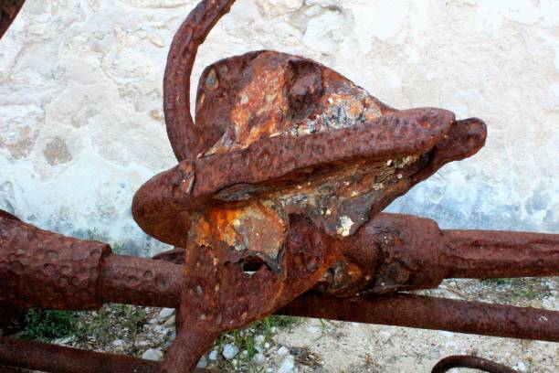 istock ancient fishing anchors 1158385679