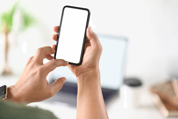 istock Businessman's hand using blank white screen mobile smart phone. 1158388889