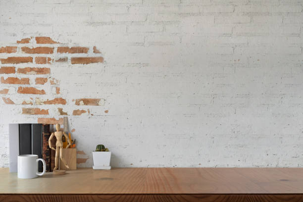 Loft workplace studio with home office supplies and copy space for montage