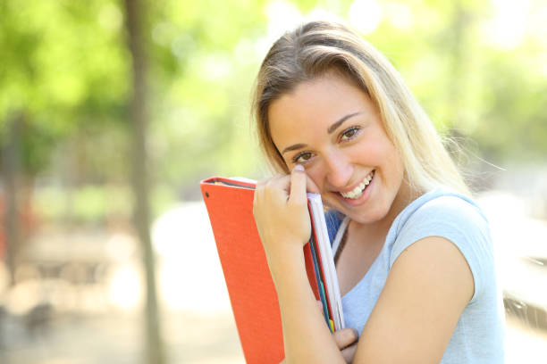 istock Timid teenage student looking at camera 1158391367