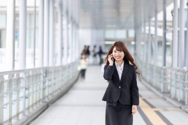 istock Business woman walking while calling 1158392787