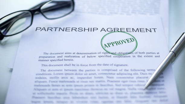istock Partnership agreement approved, seal stamped on official document, business 1158394603