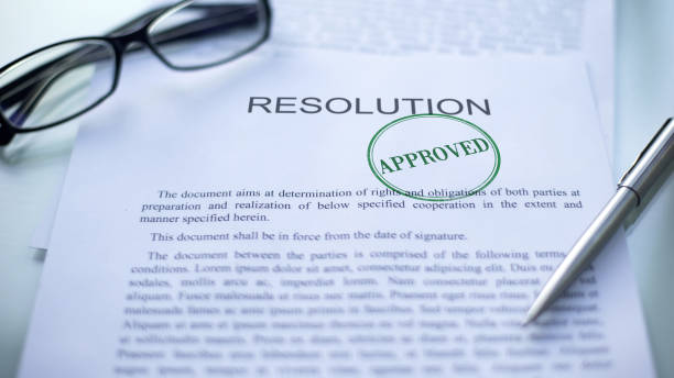istock Resolution approved, seal stamped on official document, business contract 1158394706