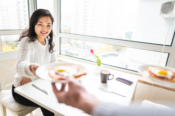istock Her favorite eating from her favorite man 1158402732