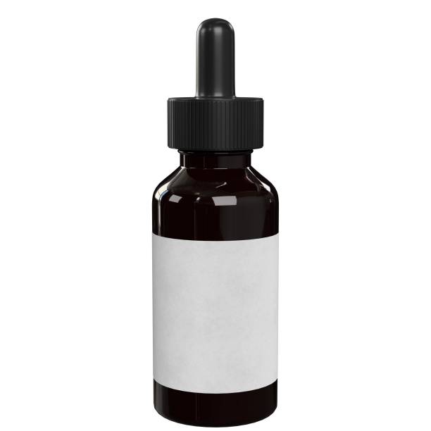 istock Dropper bottle with a dark liquid and a blank label 1158407338