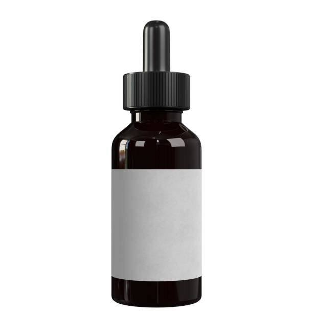 istock Dropper bottle with a dark liquid and a blank label 1158407339