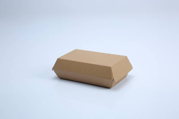 elaborar alimentos de papel y una caja de pastelconeles con fondo blanco - box blank brown white fotografías e imágenes de stock