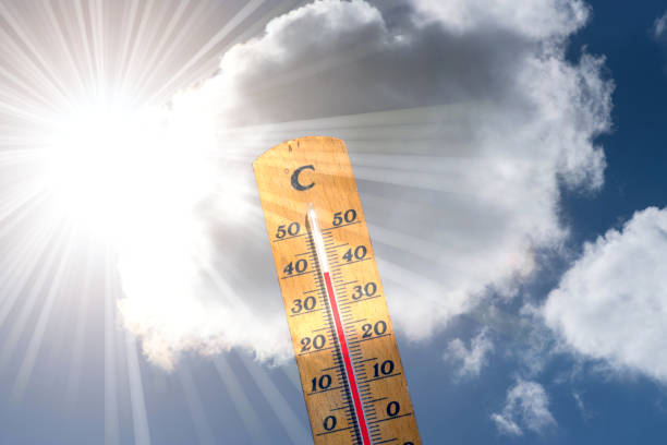 istock Heat wave in summer and a thermometer 1158413183