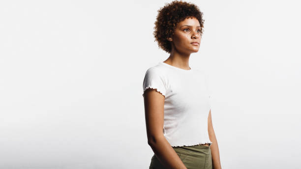 istock Young woman with curly hair 1158414143