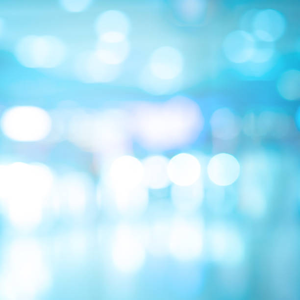 istock abstract blur beautiful blue colorful with luxury bokeh bulbs light background in gala event  for design as banner template concept 1158419457