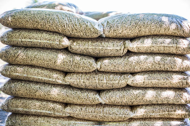 istock Stack of wooden pellets 1158421881