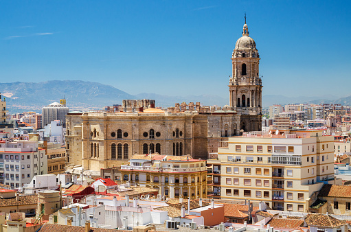Cityscape aerial view of Malaga, with cathedral and city skyline Spain.