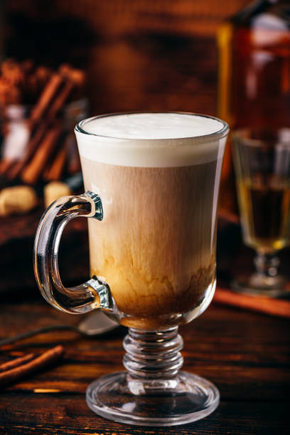 istock Coffee with Irish whiskey and whipped cream in glass 1158424984