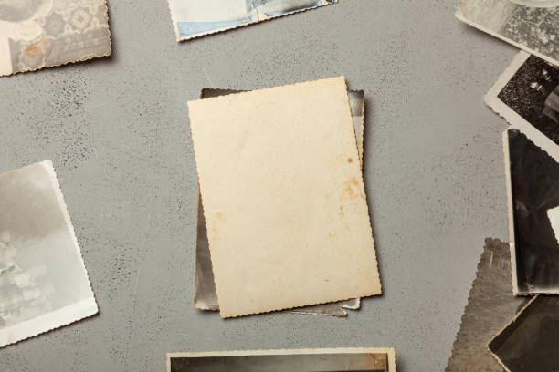 istock Old photo, blank template for picture, mock-up. Gray background. 1158428312