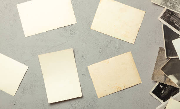 istock Old photo, blank template for picture, mock-up. Gray background. 1158429416