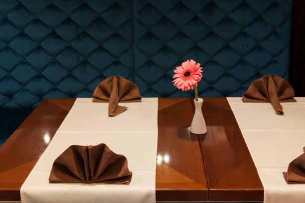 istock flower on the wooden table 1158430580