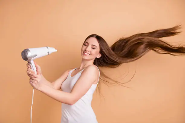 Profile side view photo cute charming nice teen teenager hold ahnd, close yes calm peaceful rest relax future date dry hairstyle dressed white top singlet isolated beige background