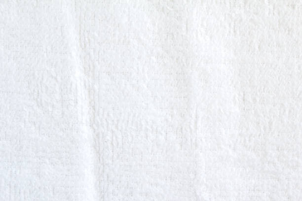 istock Closeup white crumpled soft terry towel texture background. 1158431813