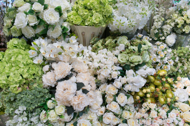 istock White decorative artificial flowers bouquet true realistic look 1158432448