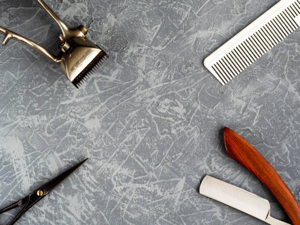 istock Tools for cutting beard barbershop on gray concrete background top view 1158433812