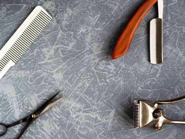 istock Tools for cutting beard barbershop on gray concrete background top view 1158433869