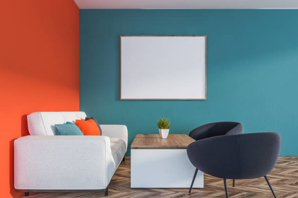 istock Orange and blue living room with poster 1158434823