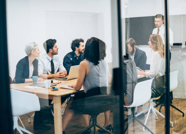 istock Young manager leading the meeting in the office 1158434865