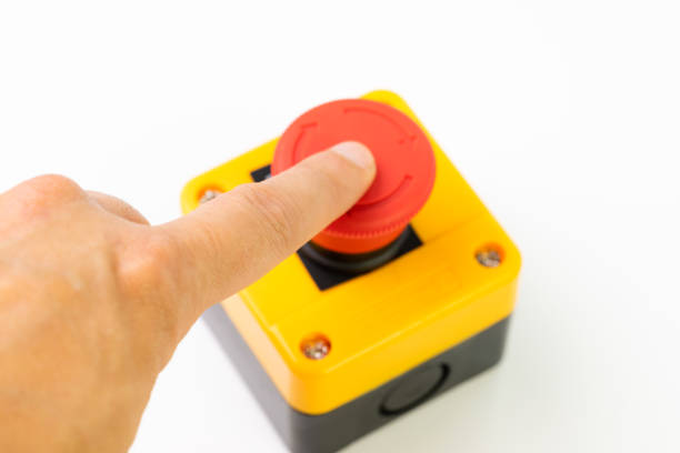 istock Hand with finger pushing red emergency button on white background 1158438255