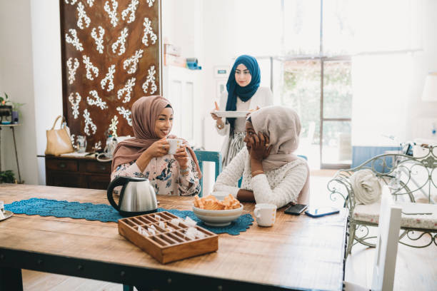 istock Three friends having breakfast together at home 1158438259