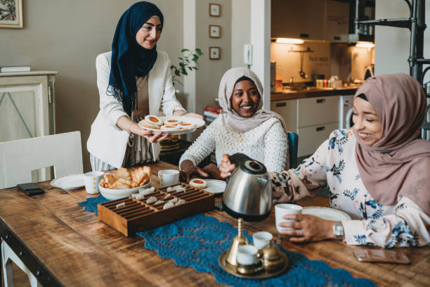 istock Three friends having breakfast together at home 1158438263
