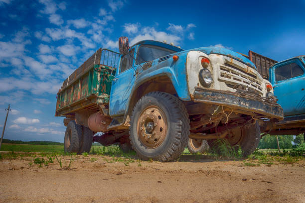 istock Old rusting truck or lorry outdoors in a field 1158438511