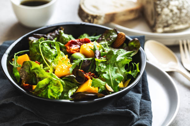 istock Mango,Grape and Sun dried tomato Salad with Balsamic dressing 1158439573
