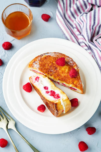 istock Ricotta raspberry stuffed French Toasts with fresh raspberries. 1158444118