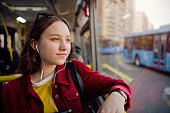 Teen girl travelling by bus