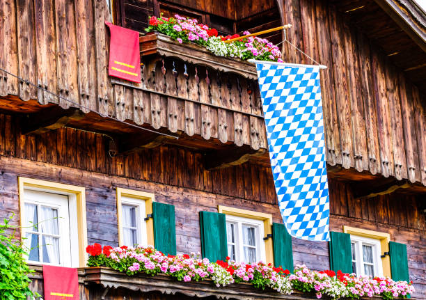 typical bavarian flag in front of a house