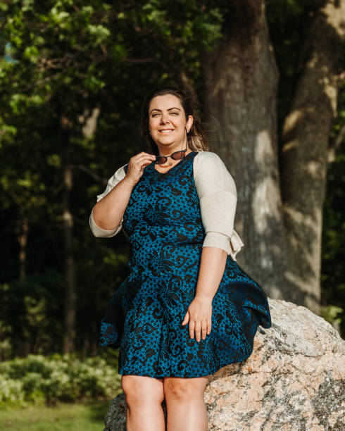 istock Plus size model enjoying the sunny day at the beach 1158450427