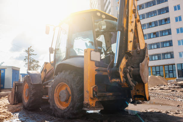 istock Wheel loader excavator or bulldozer on construction site of new building in sunlight 1158450620