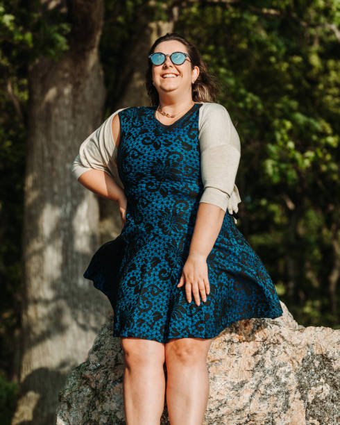 istock Plus size model enjoying the sunny day at the beach 1158451257