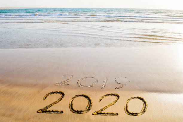 istock Happy New Year 2020 beach picture image abstract background 1158452994