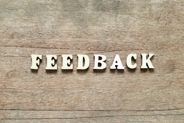 istock Letter block in word feedback on wood background 1158453004