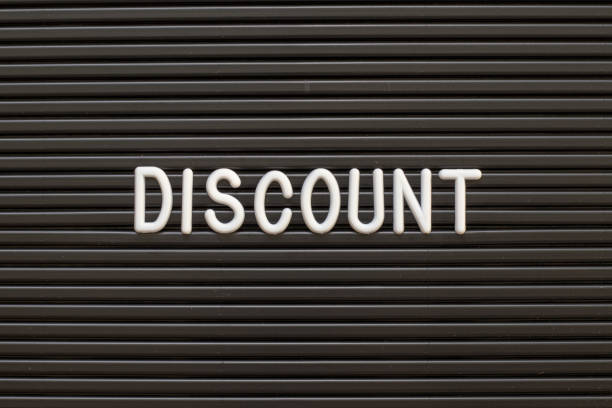 istock Black color felt letter board with white alphabet in word discount background 1158453009